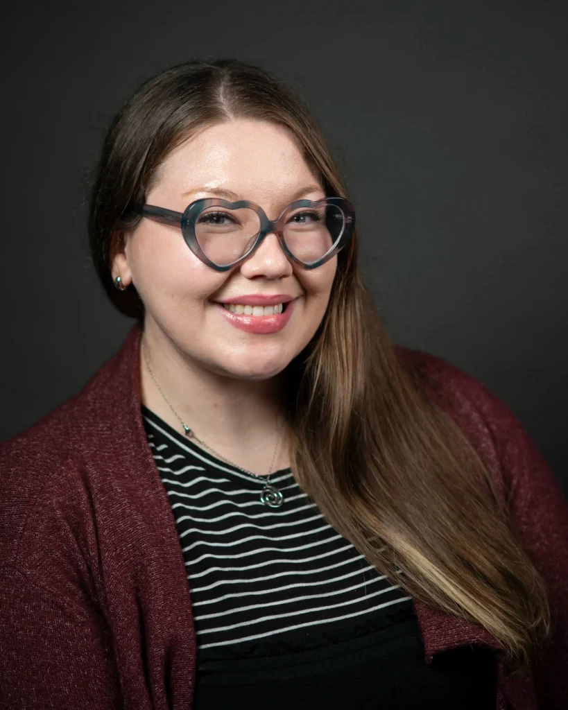 Woman with glasses and long hair